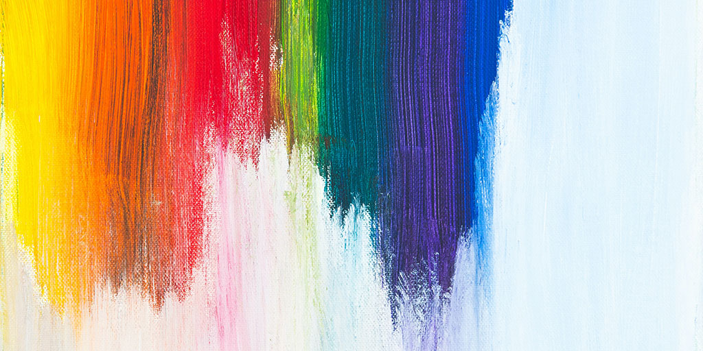 Rainbow colours on a canvas, painted in vertical brush strokes